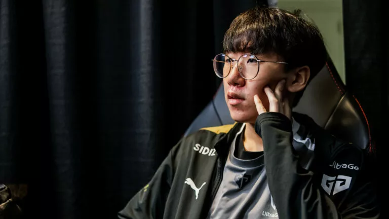 Gen.G player Ruler sits backstage at Worlds 2022