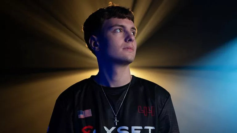 fortnite pro Clix photographed with a light shining behind him