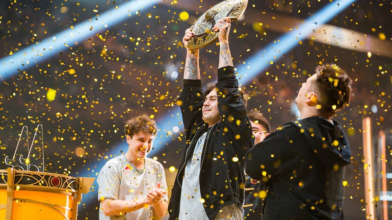 An image of Team Spirit lifting The International 2026 Aegis