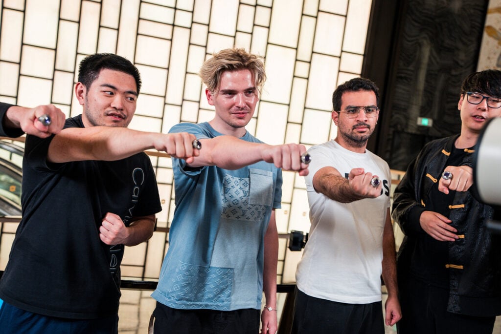A photo of Team Falcoms holding their TI rings